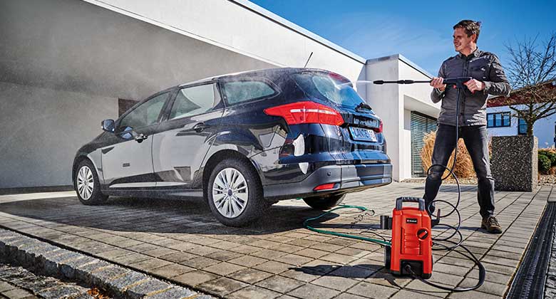 man working with high pressure cleaner